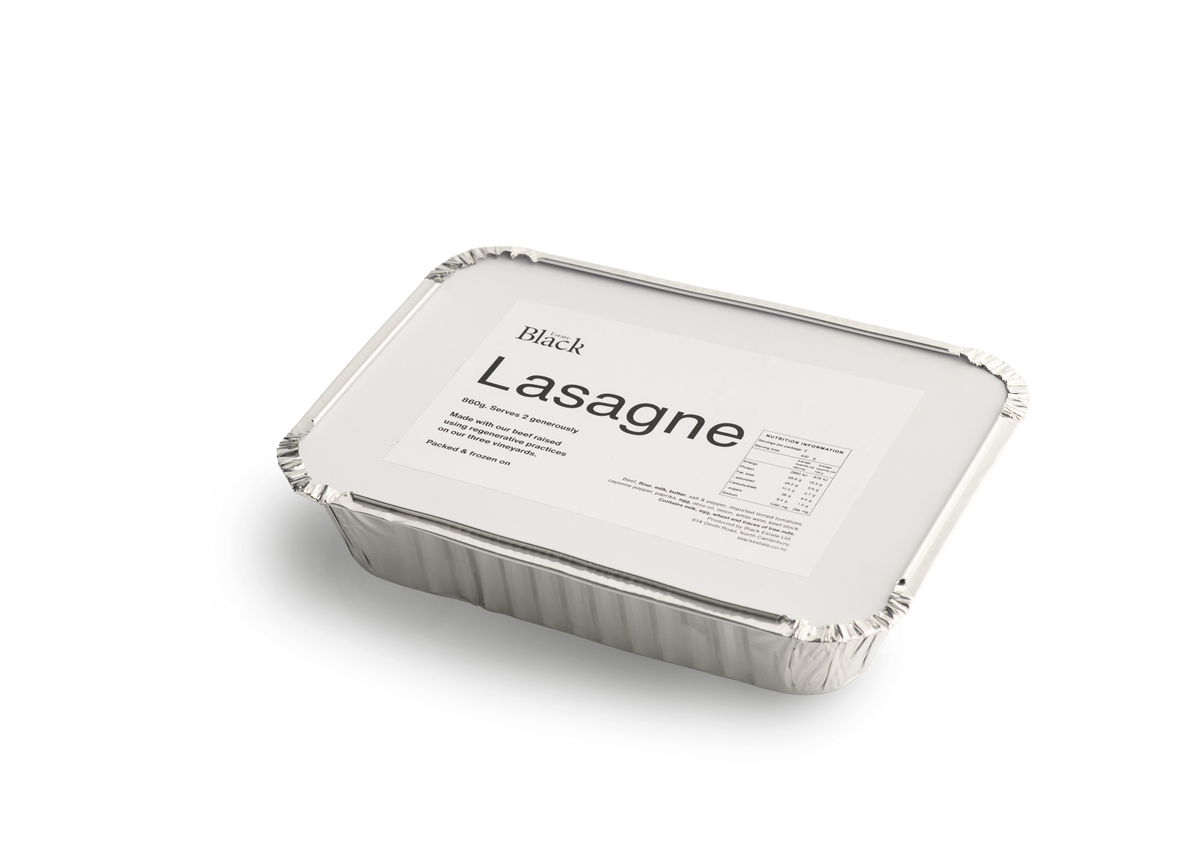 A rectangular aluminum foil tray with a white lid label reading 'Black Lasagne' on a clean white background.